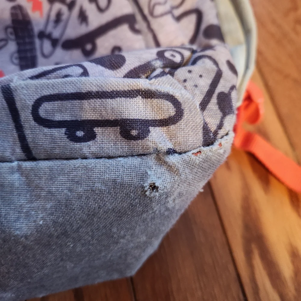 Gray and Red Kids Skateboard Backpack with Dinosaur Hand Sanitizer Charm Holder